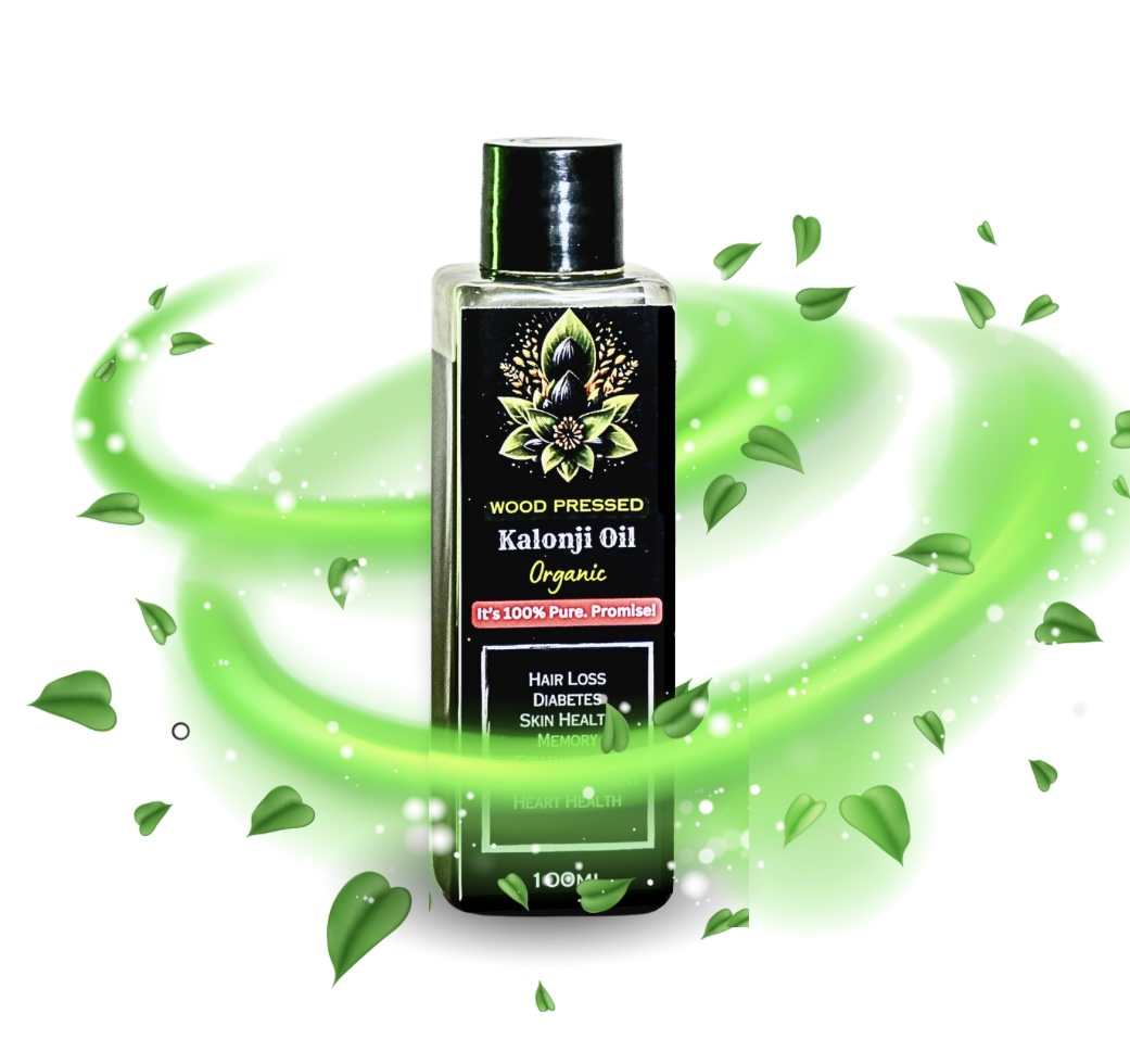 Wood Pressed Kalonji Oil, 100ml: black bottle with a gold label, in a swirl of green leaves