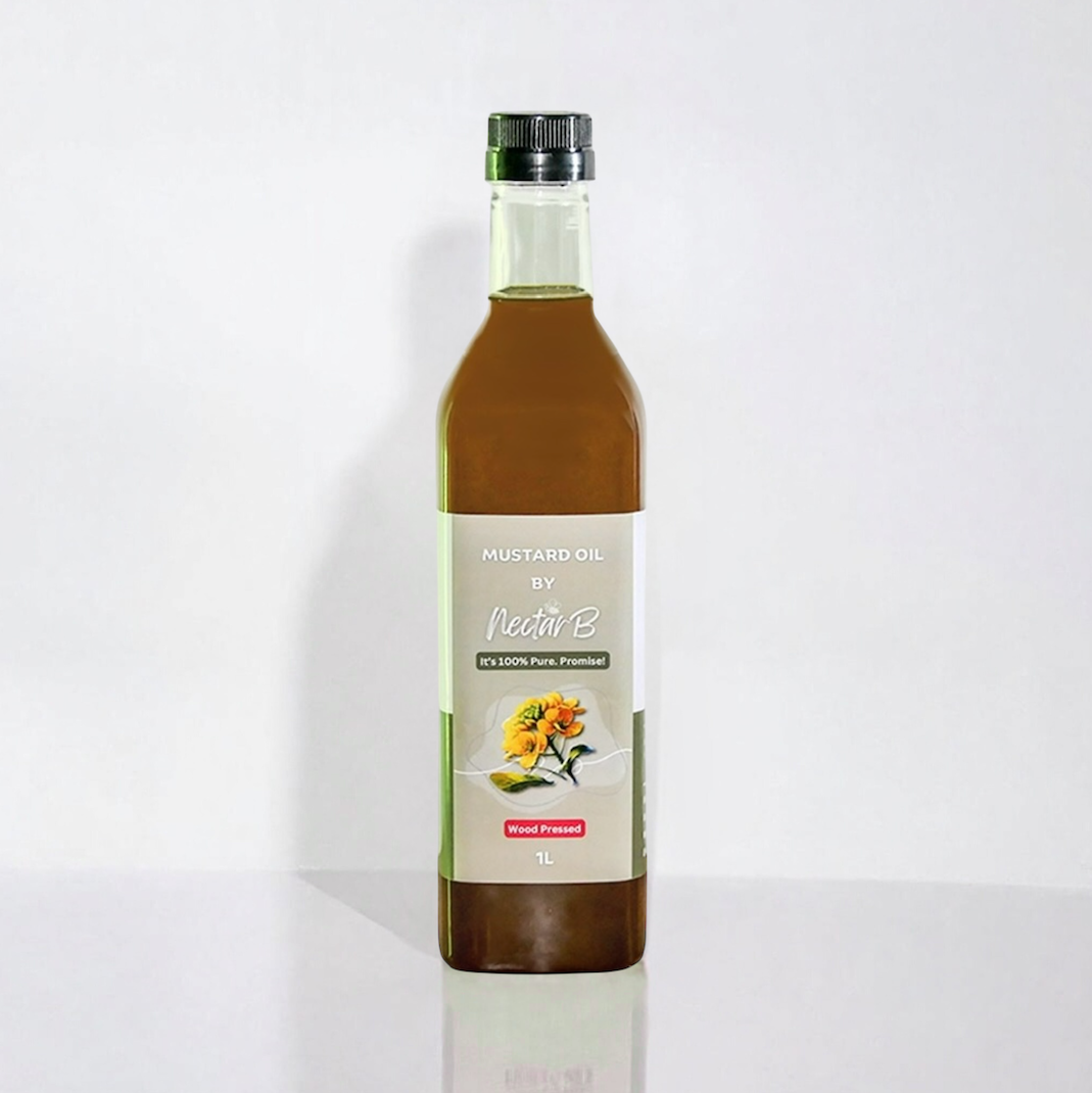Wood Pressed Mustard Oil, 1L: glass bottle of dark brown oil, green label with a yellow flower